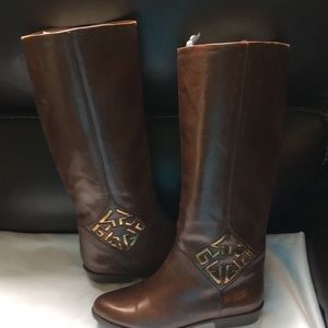 Ruggeri knee high boots.